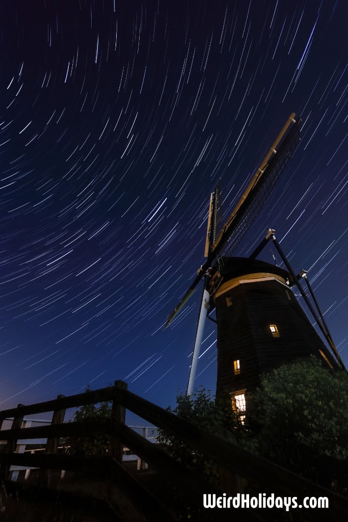 Startrails above an old Dutch windmill 