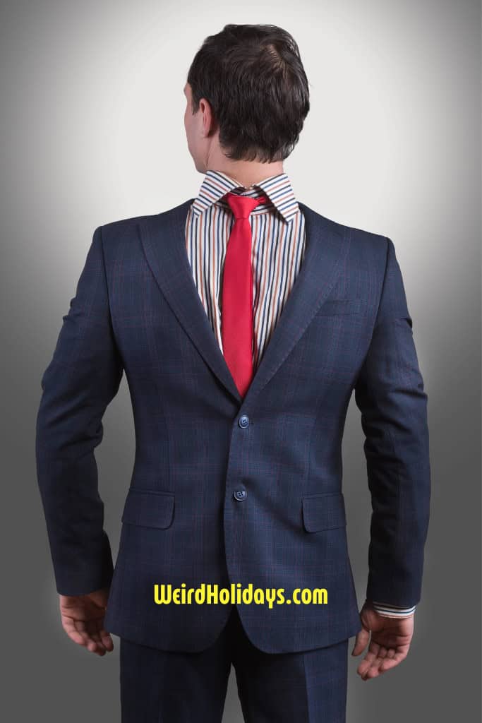 man wearing a suit back to front