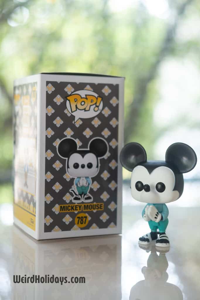 Funko Pop Mickey Mouse is wearing Thailand's national costume dress with signature pose