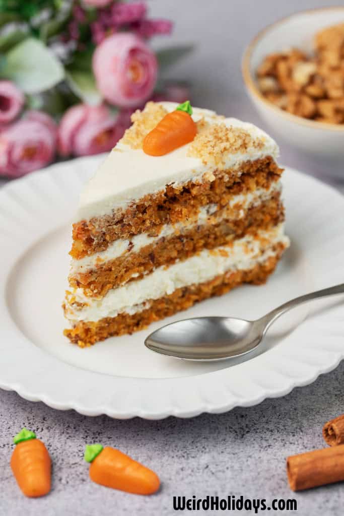 slice of carrot cake on a white plate