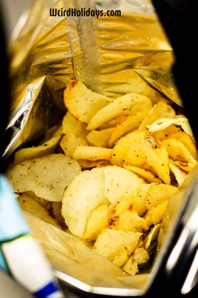 open packet of flavored potato chips