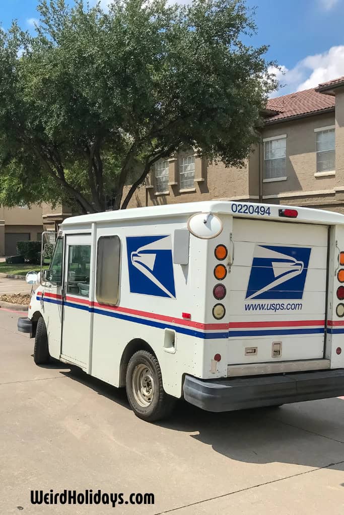 usps delivering post on a residential street